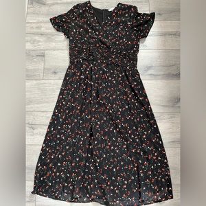 Black dress with red and white florals